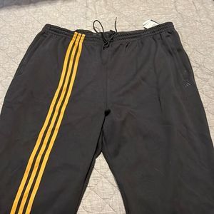 🖤Adidas x Ivy Park Black and Gold Joggers NWT gender neutral 2x